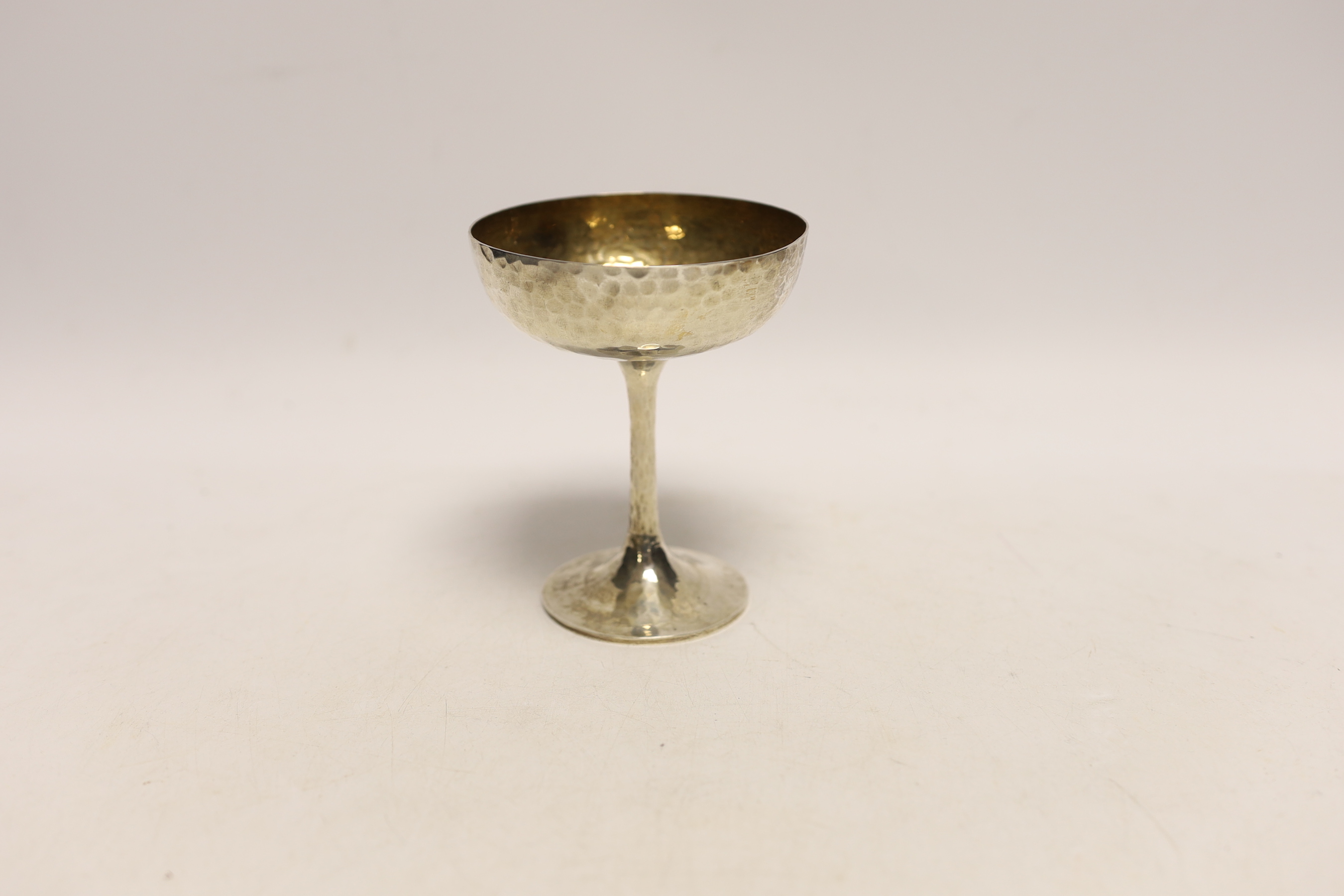 An Edwardian planished silver Champagne coupe, by Mappin & Webb, London, 1903, height 10.7cm, 4.6oz.